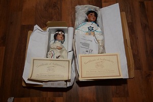 lot 153 image: Native American Theme 2 Heritage Signature Colleciton Porcelain Collector Dolls with Certificates of Authenticity