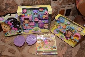 lot 151 image: Cabbage Patch Kids collectables in original packaging