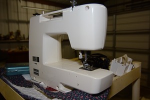 lot 466 image: Brother Model VX-1500 Sewing Maching with fabric cover