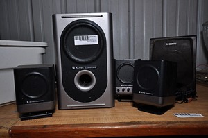 lot 282 image: Altec Lansing speaker set (4 speakers) 1 Sony speaker, & accessories