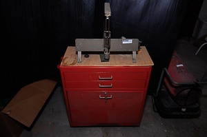 lot 302 image: Handheld mitre saw & accompanying tool box