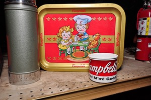 lot 326 image: Campbells memorabilia including Campbells collectable serving plate & Campbells soup cup coffee thermos included