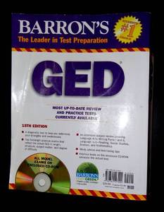 lot 38 image: BARRONS 15TH EDITION GED STUDY BOOK