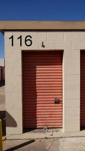 lot 116 image: UNIT E012 - 6 X 10 LOCKER (UNPAID FORECLOSURE) - LARGE PROJECTION TV, CLOTHING, AND MORE