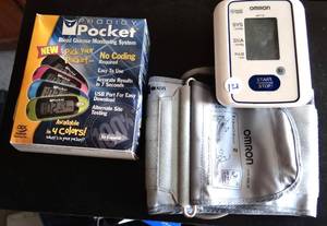 lot 121 image: OMRON BP710 BLOOD PRESSURE DIGITAL READER AND PRODIGY POCKET GLUCOSE MONITOR (UNOPENED)