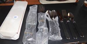lot 131 image: SET OF 4 PLACE SETTINGS - KNIFE, FORK, AND SPOON - UNUSED