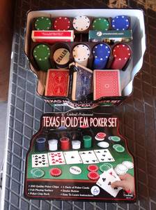 lot 156 image: TEXAS HOLDEM POKER SET WITH CARDS AND CHIPS IN TIN STORAGE BOX