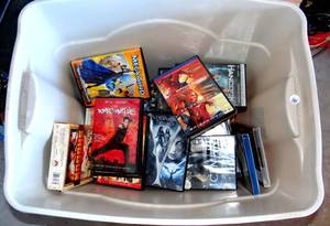 lot 141 image: LARGE STORAGE TOTE FULL OF ASSORTED DVDS