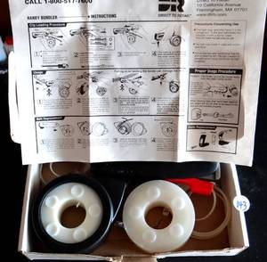 lot 143 image: Handy Bundler The Quick & Easy Fastener Tie Wrap Dispenser Kit