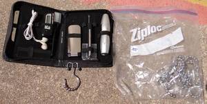 lot 255 image: PORTABLE MALE GRROMING KIT WITH MP3 PLAYER AND SET OF ROLLING SHOWER CURTAIN HOOKS