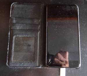 lot 264 image: LARGE CELLPHONE WITH CASE AND USB - POWERED ON WHEN TESTED