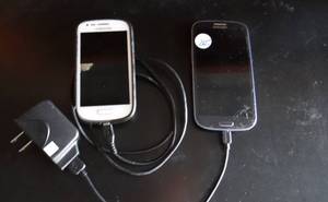 lot 265 image: PHONE LOT AS SHOWN - ONE IS GALAXY 3 BUT HAS DAMAGE SCREEN - BOTH POWERED ON WHEN TESTED