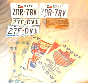 lot 25 image: Collectible lot #2 - Texas License plates  Shot bags - Winchester, All-American, Lawrence  Star brick