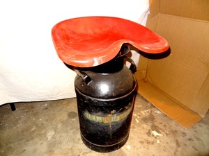 lot 44 image: Vintage Milk Can Stool with welded on tractor seat ( Texas Tech Colors)
