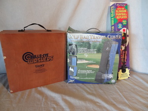 lot 58 image: Golf bag cover, blow dart gun, washer pitching cup box