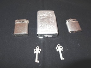 lot 95 image: Vintage Cigarette case, Lighters, and keys