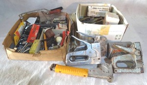 lot 125 image: Misc lot  includes staple guns, lots of staples, and fasteners