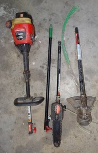 lot 146 image: Weedwacker Lot #2 (Troy-bilt w chainsaw attachment)