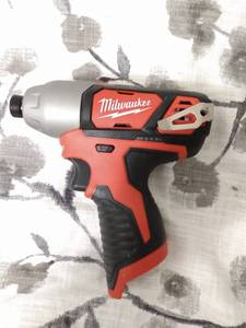 lot 123 image: MILWAUKEE M12 IMPACT DRIVER