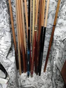 lot 142 image: 13 POOL STICKS AND 3 LONG REACH HELPER STICKS