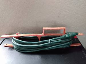 lot 111 image: APROXIMATELY 32 FOOT EXTENISION CORD WITH HOLDER