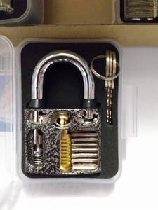 lot 64 image: LOCKSMITH TRAINOR KIT CONTAINS 3 DIFFERENT STYLE LOCKS FOR LOCK PICK TRAINING