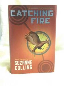 lot 54 image: THE HUNGER GAMES CATCHING FIRE BOOK