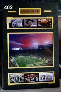 lot 402 image: CUSTOM MATTED GREEN BAY PACKERS DISPLAY WITH BRASS ENGRAVED PLATES READY TO FRAME - $89.00 VALUE
