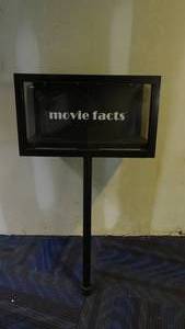 lot 50 image: Movie Facts 4-Compartment Movie Information Stand, Great for a Media Room