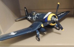 lot 3 image: Airplane CORSAIR F4U Navy MODEL 24 x 22 x  7.25 H  Pilot in cockpit