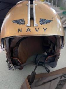 lot 4 image: VIETNAM ERA APH-5 NAVY FLIGHT HELMET  GENTEX.  HAS  earphones. , CORDS sun visor,  GOLD & BLUE in canvas carry bag