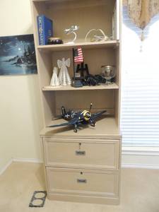 lot 21 image: Stanley  2 piece office bookshelf with 2 bottom drawers. Locks and keys 79x29x22  NO CONTENTS INCLUDED