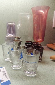 lot 64 image: 10 pink flower vase, lantern glass cover 3 shot glasses,  5 red wheat design shot glasses, glass drink mixer