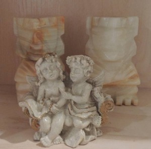 lot 76 image: 1991 Mt. Pinatubo angels 3 x 3 pair of marble Egypt head book ends