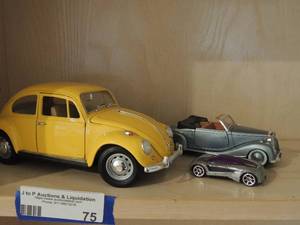 lot 75 image: 1950 Mercedes 1705 model car 2005 Metal car, yellow 1967 VW Beetle