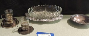 lot 84 image: set of coasters, shot glasses in silver holder, silver soup bowl, divided glass platter 10x7