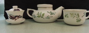 lot 124 image: Japanese covered tea cup on saucers    Andrea Sadek tea pot with one tea cup