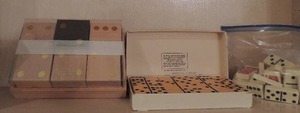 lot 137 image: Bag of coca cola dominoes and box of dominoes set of wooden dice silver box game of chicken foot