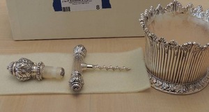 lot 8 image: Neiman Marcus  Cork screw, wine bottle cork in original silver platted box