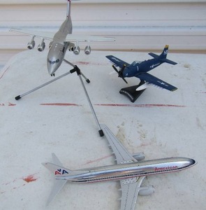 lot 172 image: Model planes- Blue Marines A-1H SKY RAIDER, AA Boeing 737-800 Gemini 250, Gemini 200 NWA Airlinc British aerospace BAE 1461RJ-85