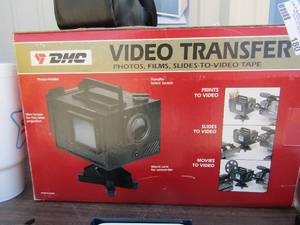 lot 180 image: DMC Video transfer photos film slides to video tape