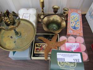 lot 192 image: Brass candle holders with large lot of new tea lights
