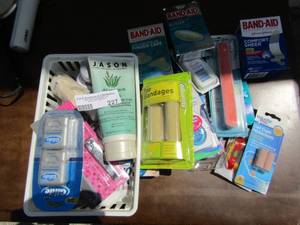lot 227 image: Misc. lot- makeup, bandages, floss, etc.