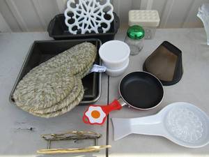 lot 230 image: Kitchen lot- loaf pans, parmesan cheese shaker, skillets, etc.
