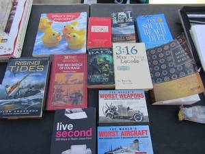 lot 269 image: Rising Tides, Websters dictionary and South Beach Diet books