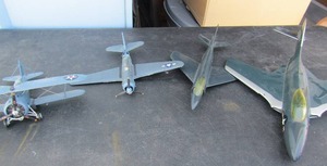 lot 279 image: US Navy 00219 #4 jet,   Topping model Navy plane,   Topping model #9 (broken tail),   single passenger NAVY chopper F3F-2