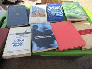 lot 291 image: Lot of books- Texas almanac  The search for Air surfers by Stephen Barclay Oceanography and more