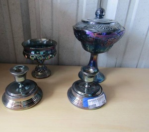 lot 147 image: 2  CARNIVAL GLASS Candle holders,  Carnival candy dish  &   covered carnival glass dish