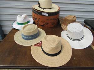 lot 333 image: Various lot of hats, white woven womens, Tula sun hat, Nike Golf hat western hat empty Stetson box and more