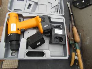 lot 370 image: Chicago electric drill with charger and battery hand saw and yard shears